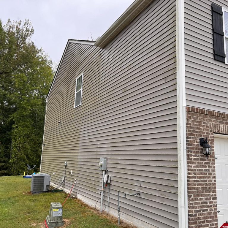 Siding power washing before